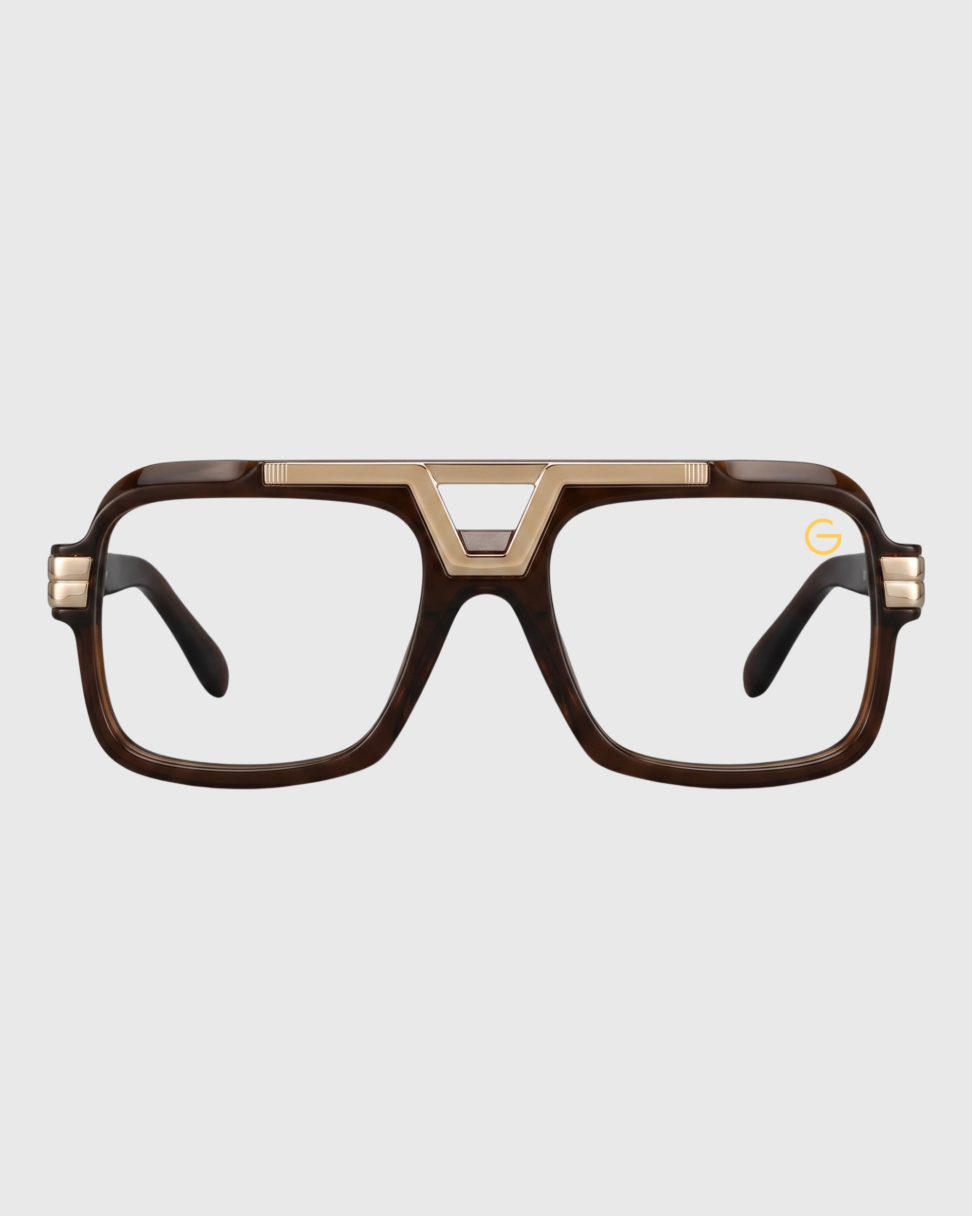 A pair of stylish glasses featuring brown and gold frames, showcasing a modern design.