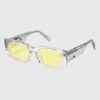 Plastic sunglasses with yellow lenses, showcasing a modern and stylish design suitable for sunny weather.