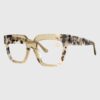 Tortoise print glasses with a stylish gold frame, showcasing a blend of classic and modern design elements.