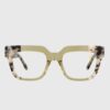 Tortoise shell cat eye glasses with a stylish design, showcasing a blend of brown and amber hues.