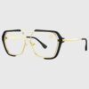 Black and gold glasses featuring a stylish gold frame, showcasing a modern and elegant design.