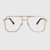 Gold frame glasses featuring sleek metal arms, showcasing a stylish and modern design.