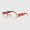 Floral print glasses featuring decorative designs on the temples, showcasing a stylish and vibrant aesthetic.