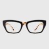 A pair of stylish glasses featuring a leopard print design on the temples, showcasing a bold and trendy look.