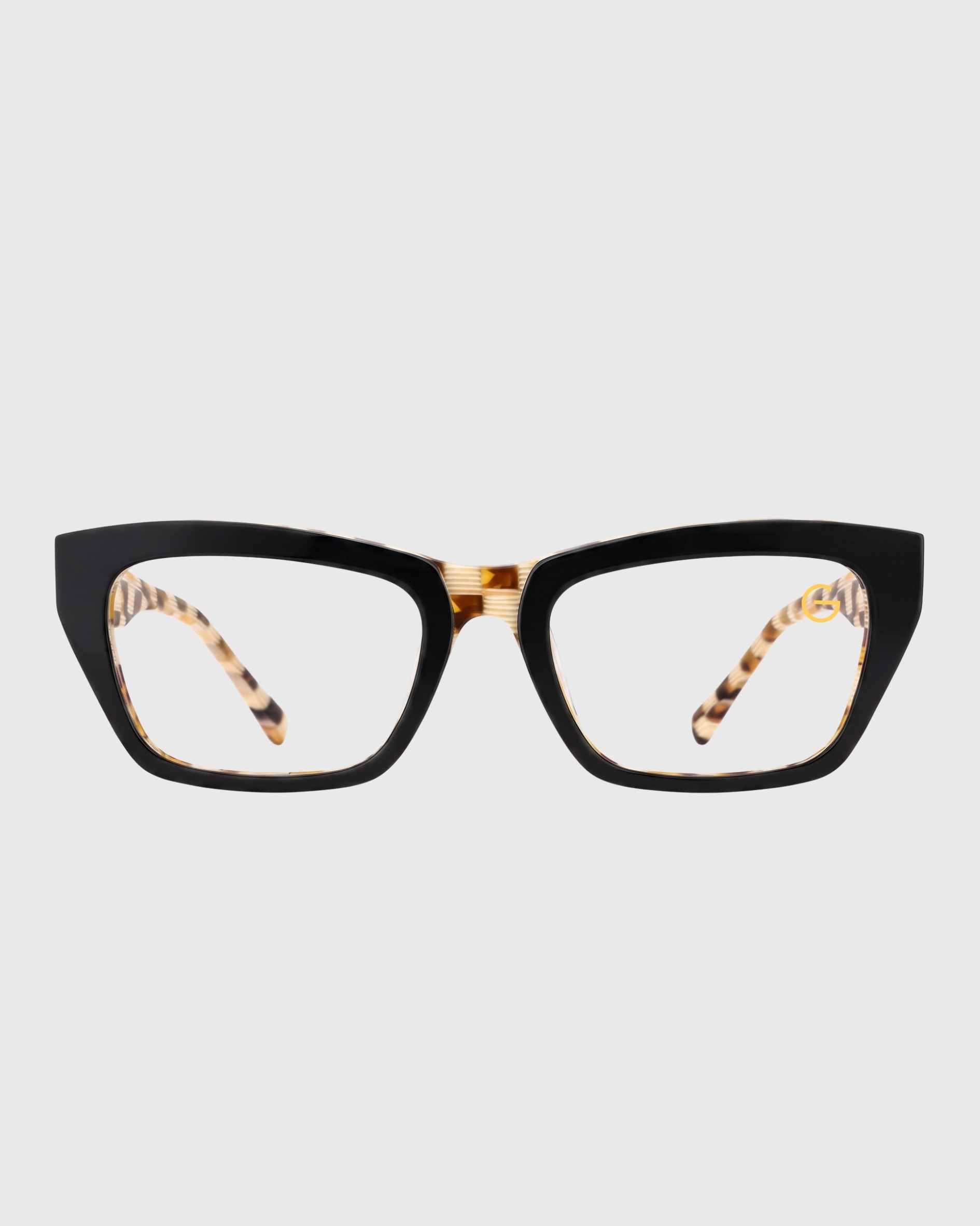 A pair of stylish glasses featuring a leopard print design on the temples, showcasing a bold and trendy look.
