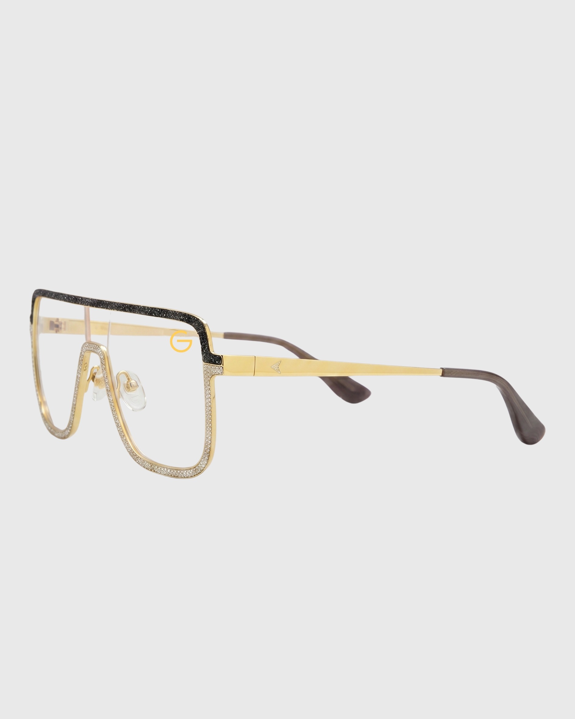 Metal glasses with a gold frame, showcasing a sleek and elegant design suitable for various occasions.