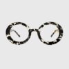 A pair of glasses featuring a stylish leopard print frame, showcasing a bold and trendy design.