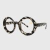 A pair of leopard print glasses with a stylish frame, showcasing a bold and trendy design.