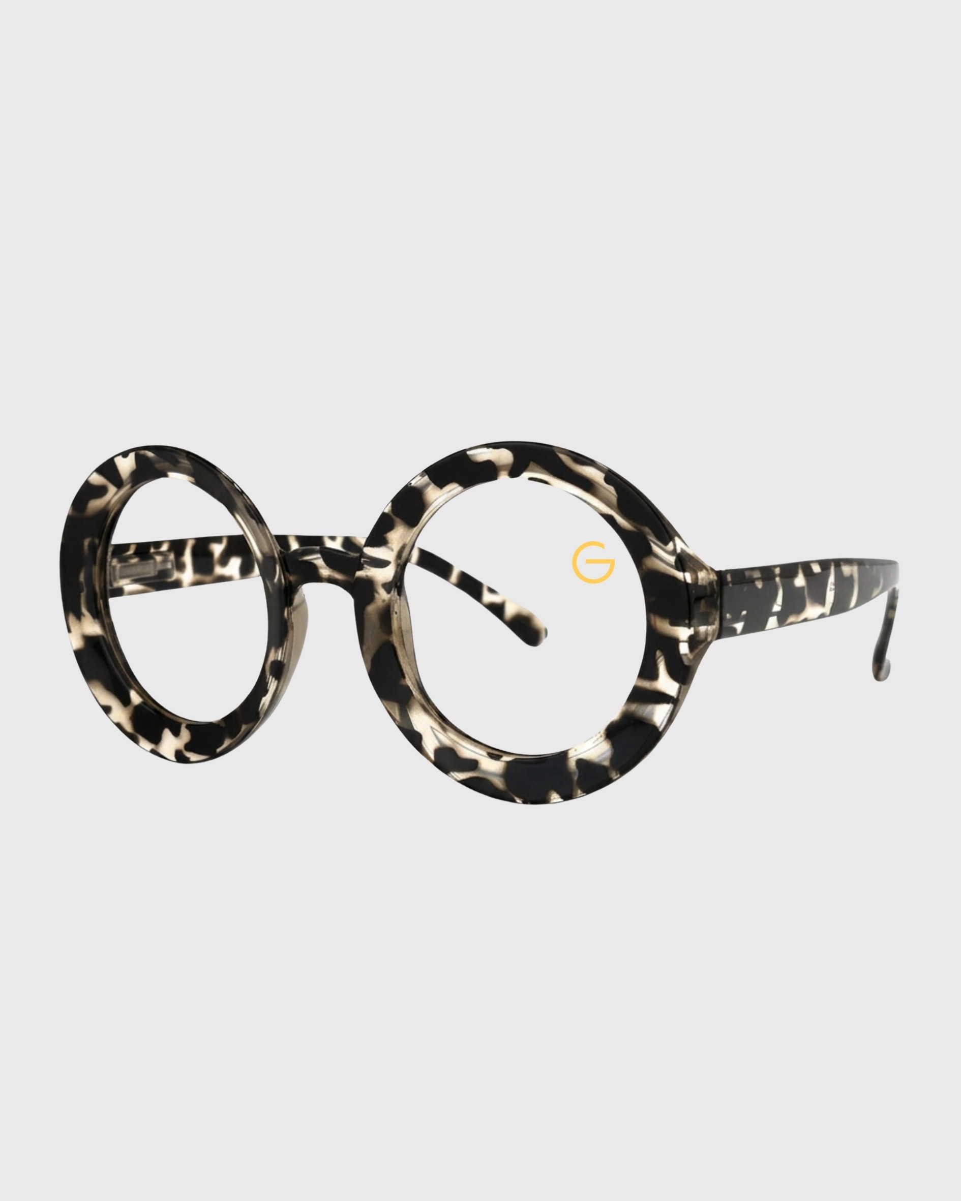A pair of leopard print glasses with a stylish frame, showcasing a bold and trendy design.