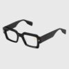 A pair of stylish black glasses featuring elegant gold accents on the frames.