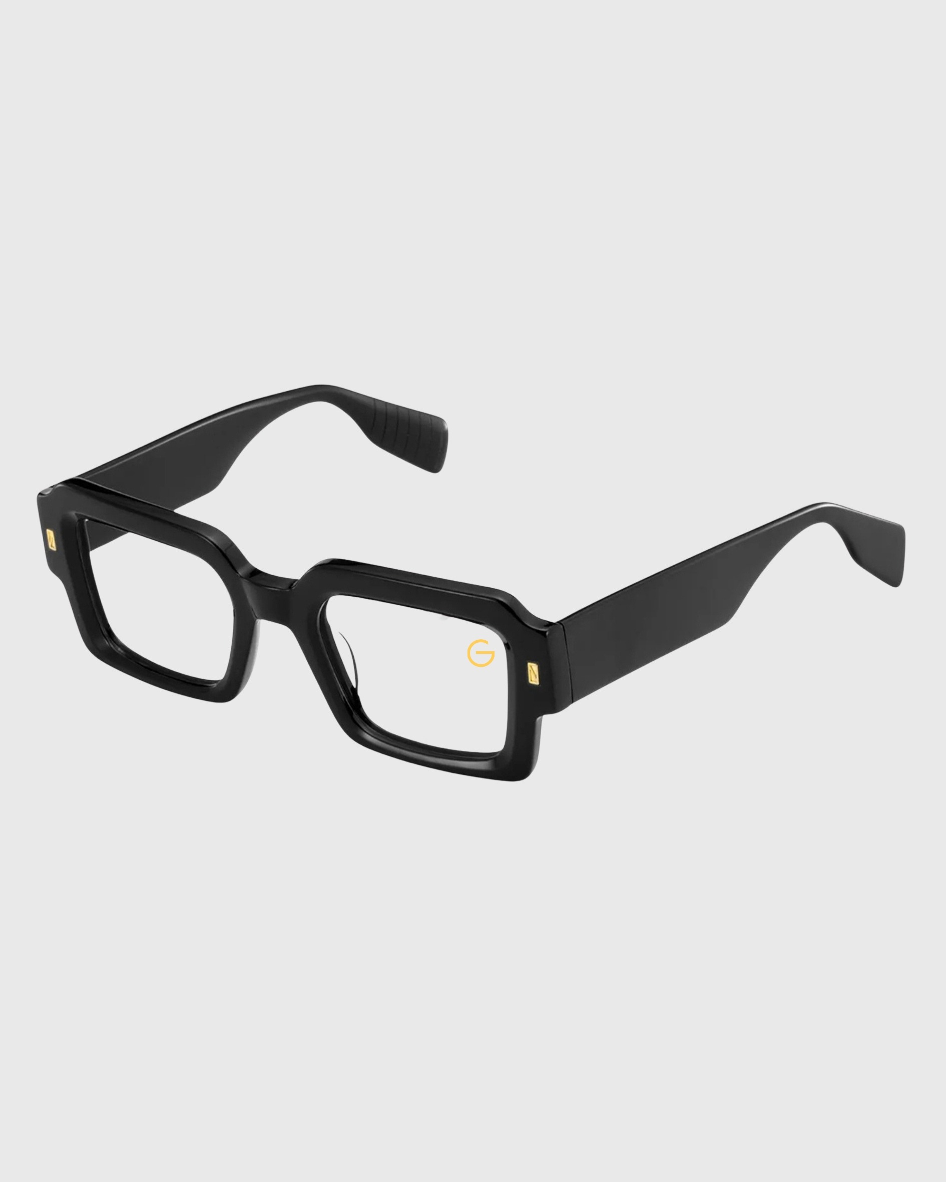 A pair of stylish black glasses featuring elegant gold accents on the frames.