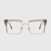 A pair of metal-framed glasses with clear lenses, showcasing a modern and stylish design.