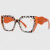 Orange cat print glasses with black frames, showcasing a playful and unique design for eyewear enthusiasts.