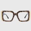 Leopard print glasses with gold accents, showcasing a stylish and bold design.