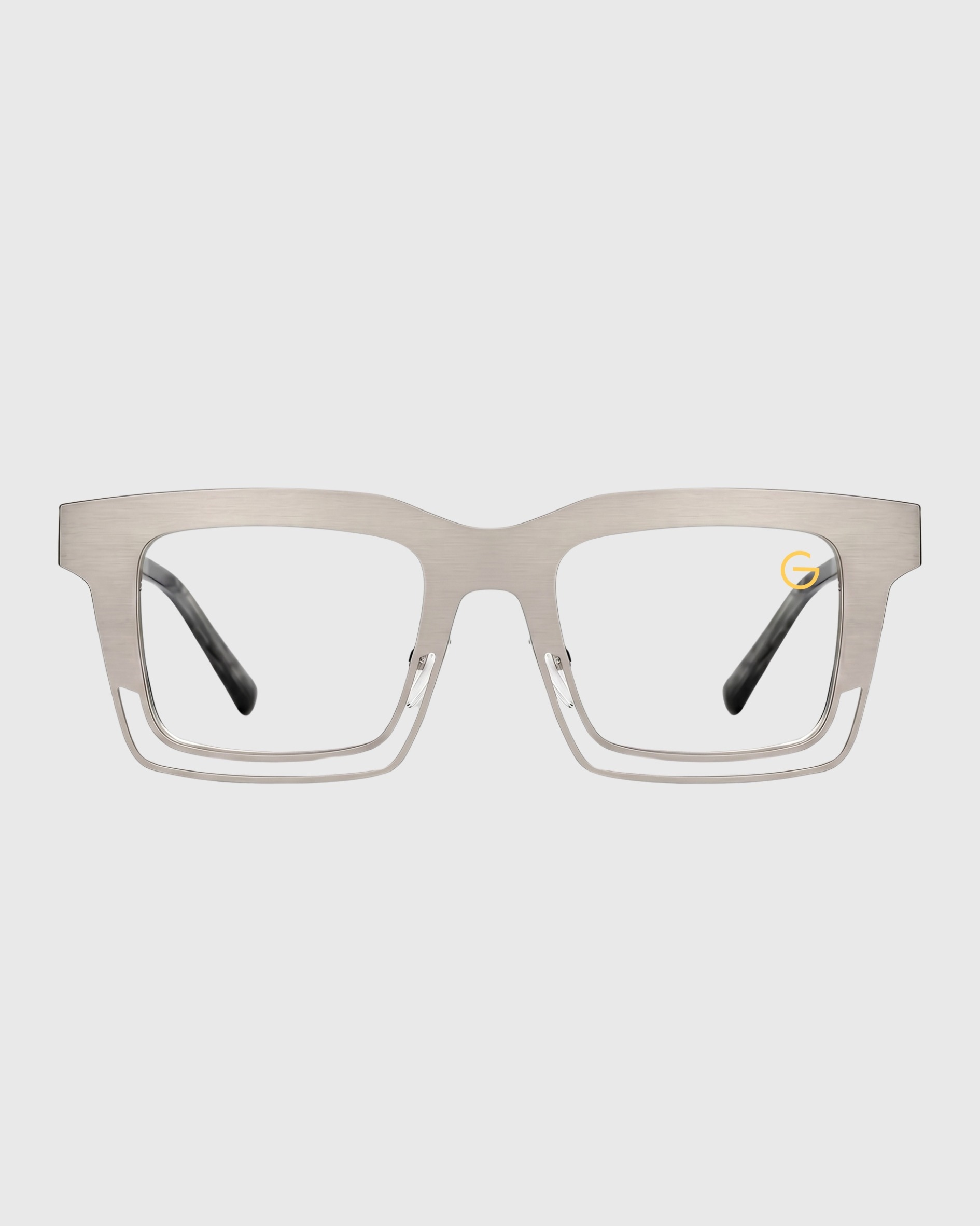 A pair of metal-framed glasses with clear lenses, showcasing a modern and stylish design.
