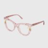 A pair of stylish glasses featuring pink frames with elegant gold detailing.