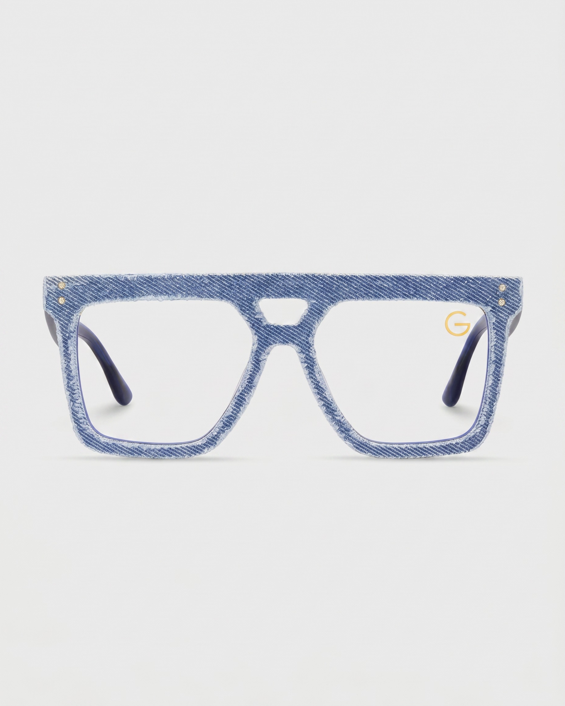 Blue denim glasses with a sleek metal frame, showcasing a unique and stylish design.