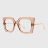 Clear plastic square frame glasses displayed against a neutral background.