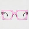 Square pink plastic glasses displayed against a neutral background, showcasing their modern design and vibrant color.