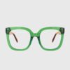 A pair of green glasses featuring a stylish gold frame, showcasing a modern and elegant design.