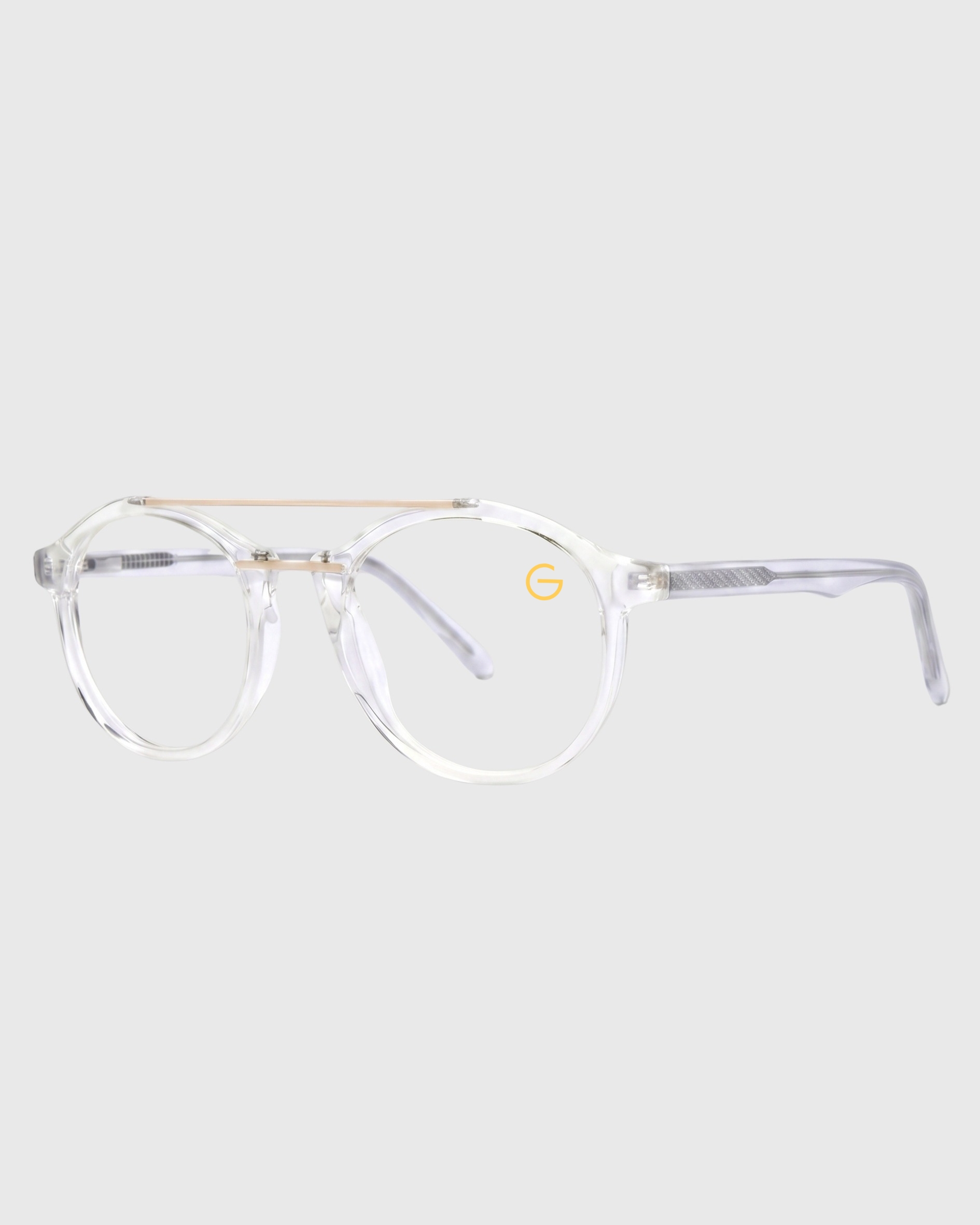 A pair of glasses featuring clear lenses and elegant gold rims, showcasing a stylish and modern design.